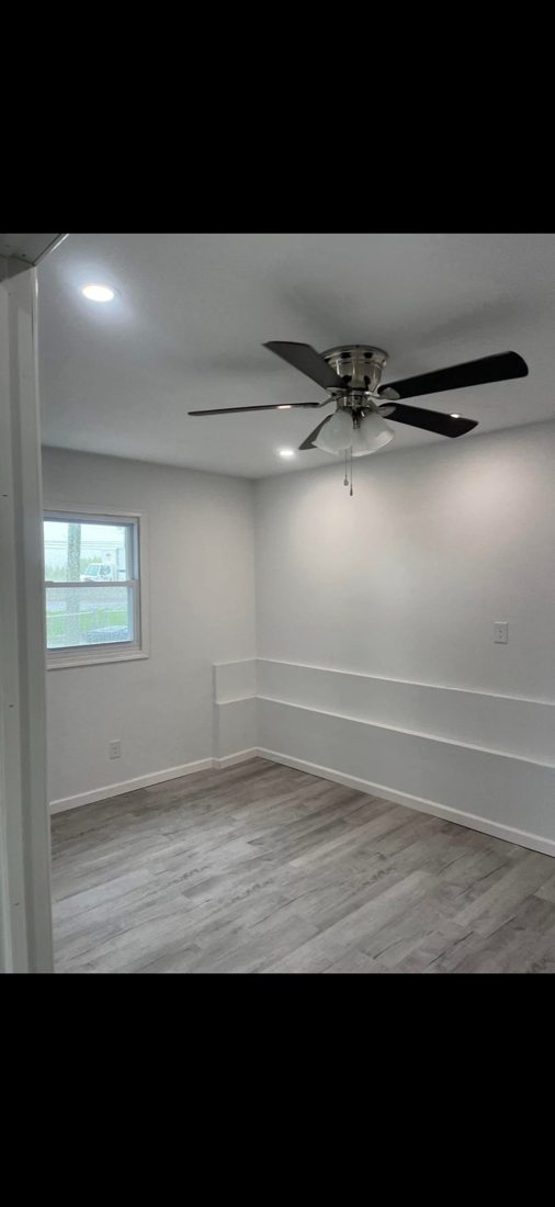 Renovated interior with recessed lighting